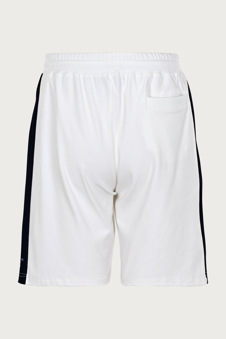 White pants with black stripes on the sides