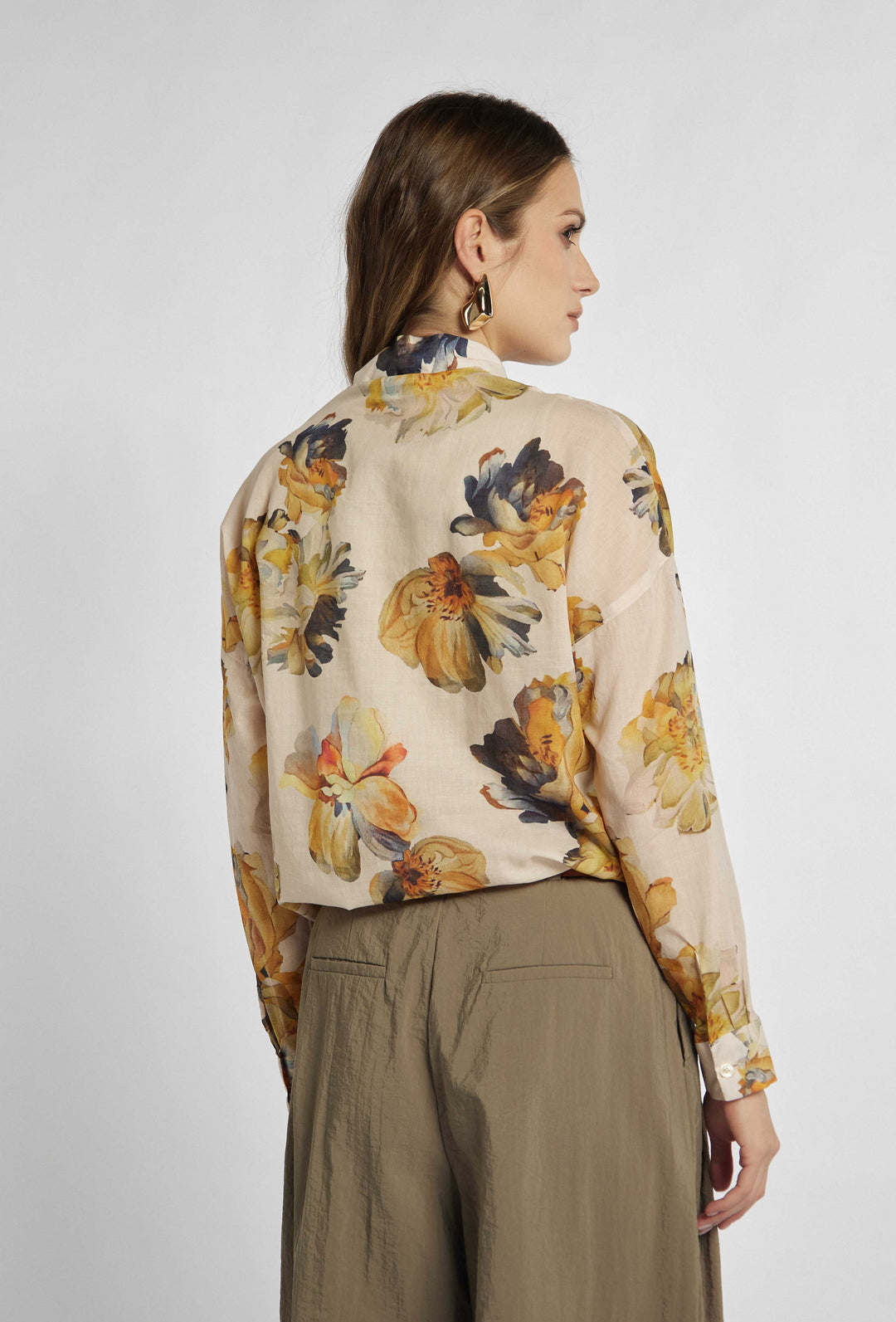 Chemisier élégant à col et motif floral