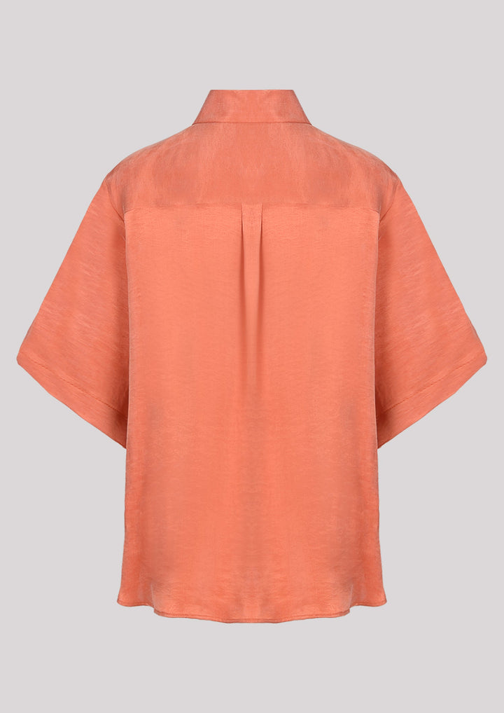 Unbuttoned short sleeve shirt in orange color