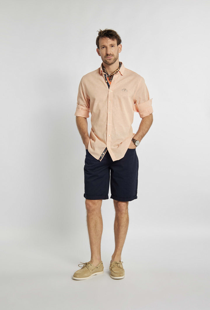 Campione-shirt in zachtoranje tint en patroon op de borst