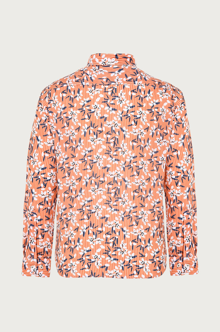 Orange shirt with unusual white and navy blue floral pattern