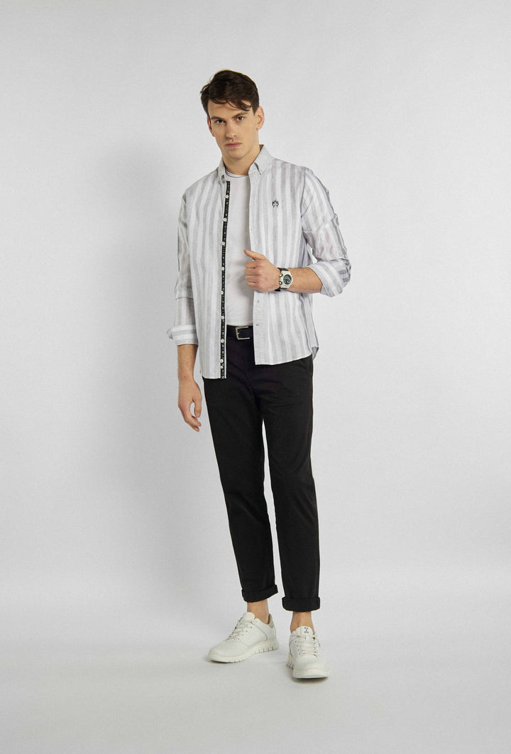White shirt with gray vertical stripes with logo