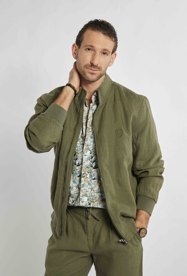 Blouse in khaki color with sigil on chest