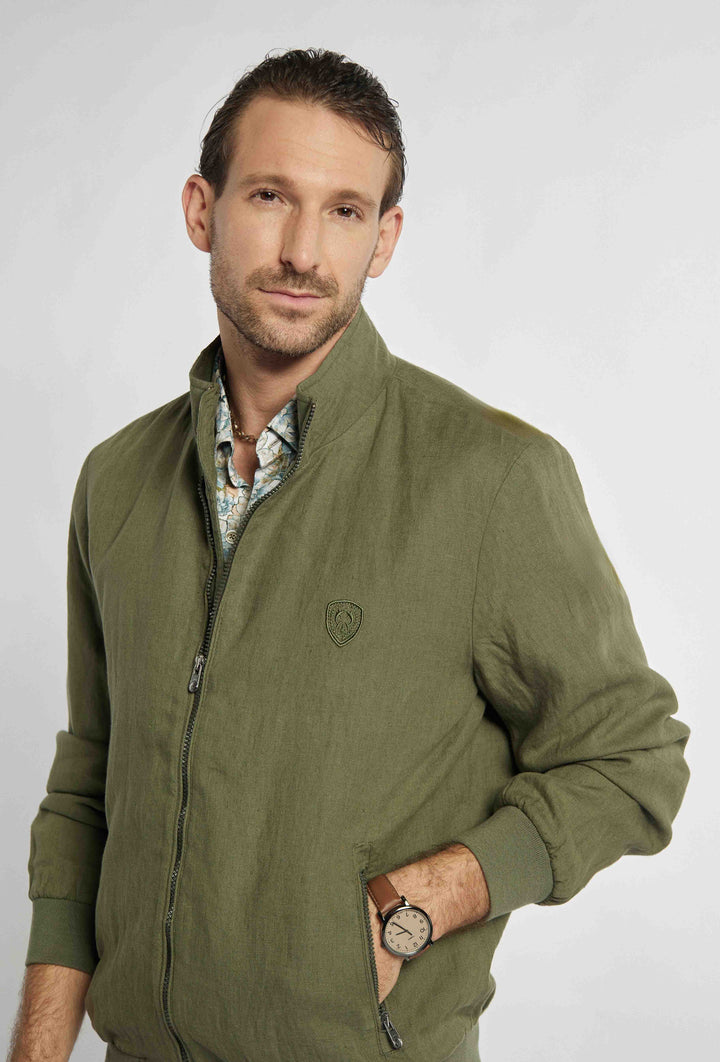 Blouse in khaki color with sigil on chest