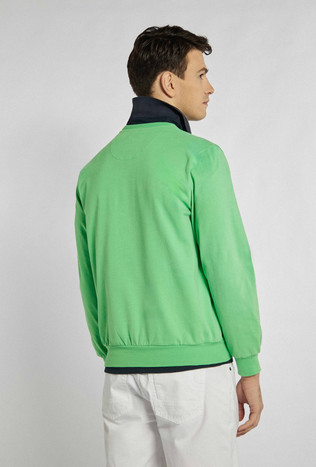 Green sweatshirt with ribbed cuffs and brand logo