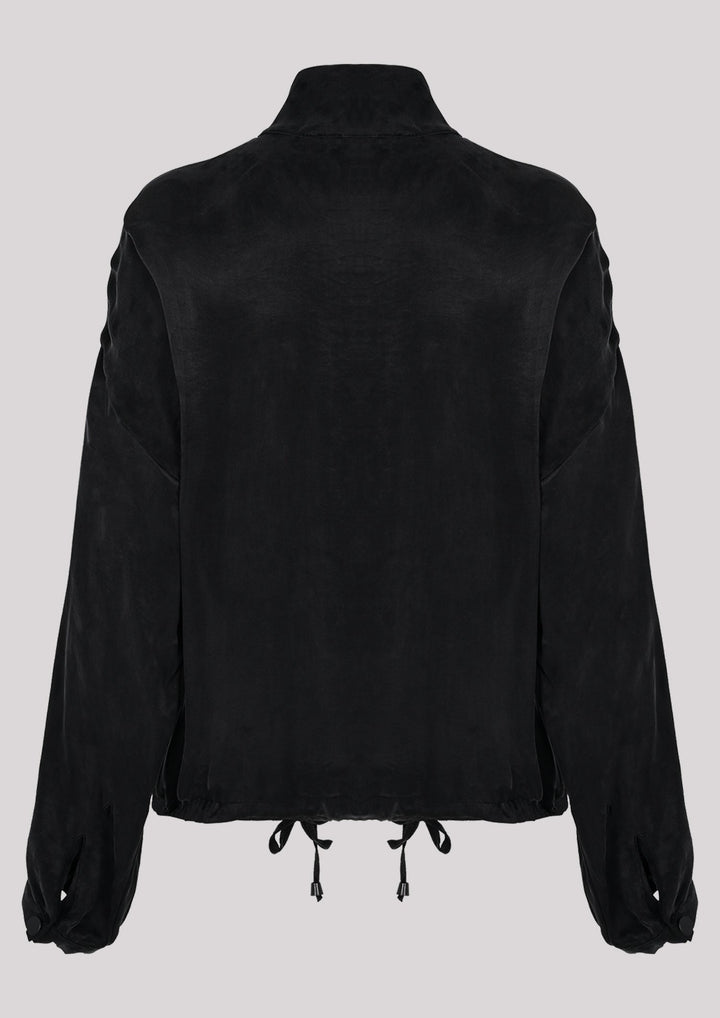Airy blouse with stand-up collar unbuttoned at the neck in black color