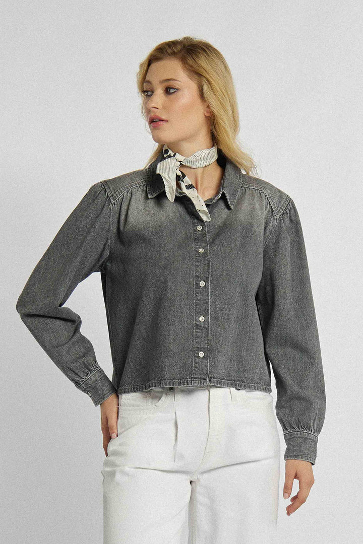Unbuttoned denim shirt with a shorter cut