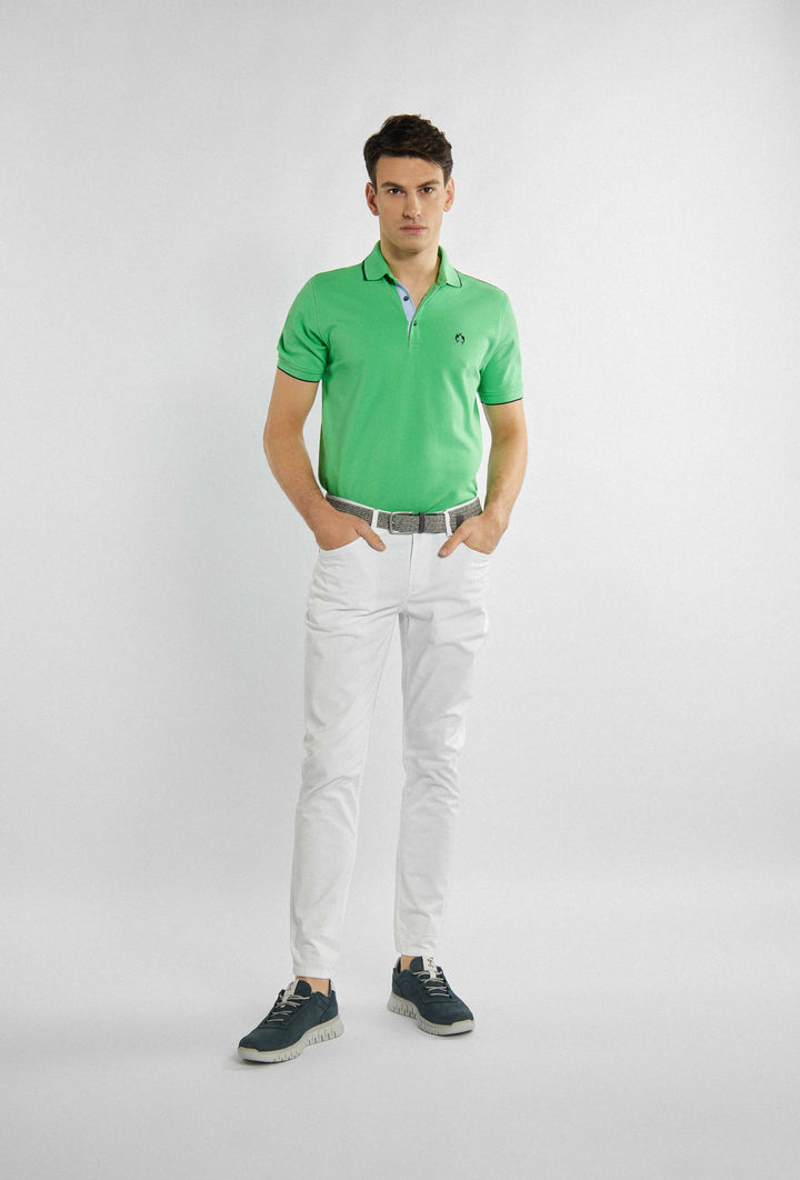 Lange witte broek met zakken en fijne details