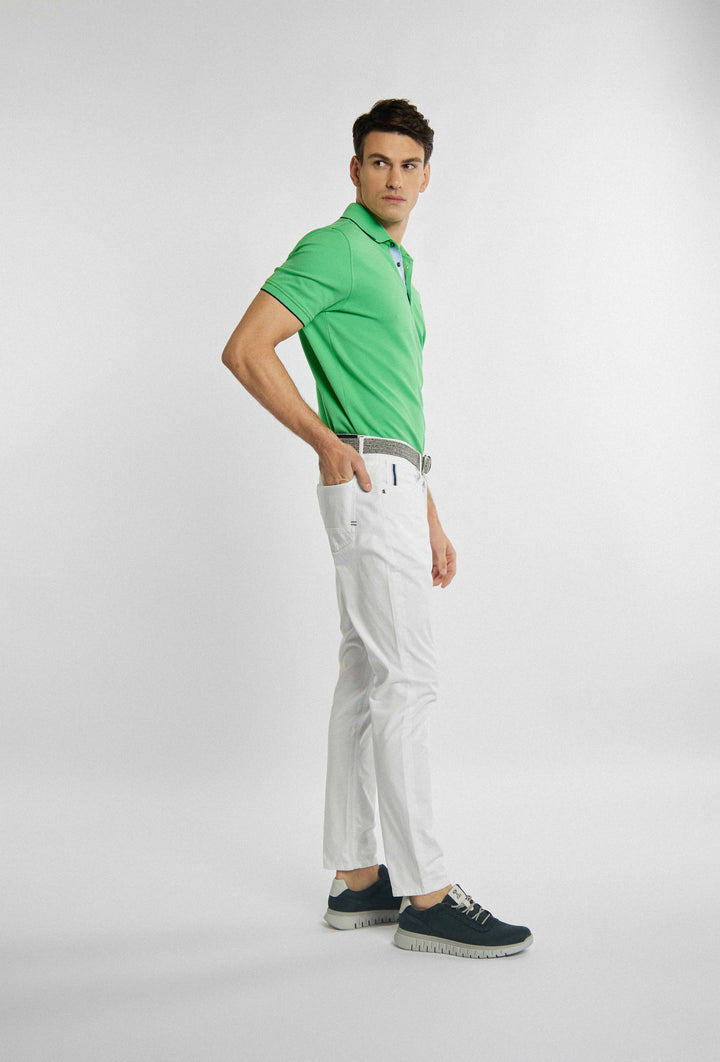 Lange witte broek met zakken en fijne details