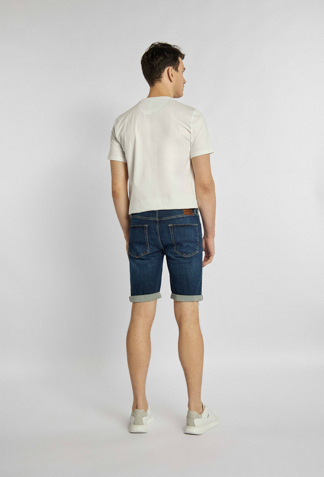 Short denim shorts with sewn-on details and turned-up legs