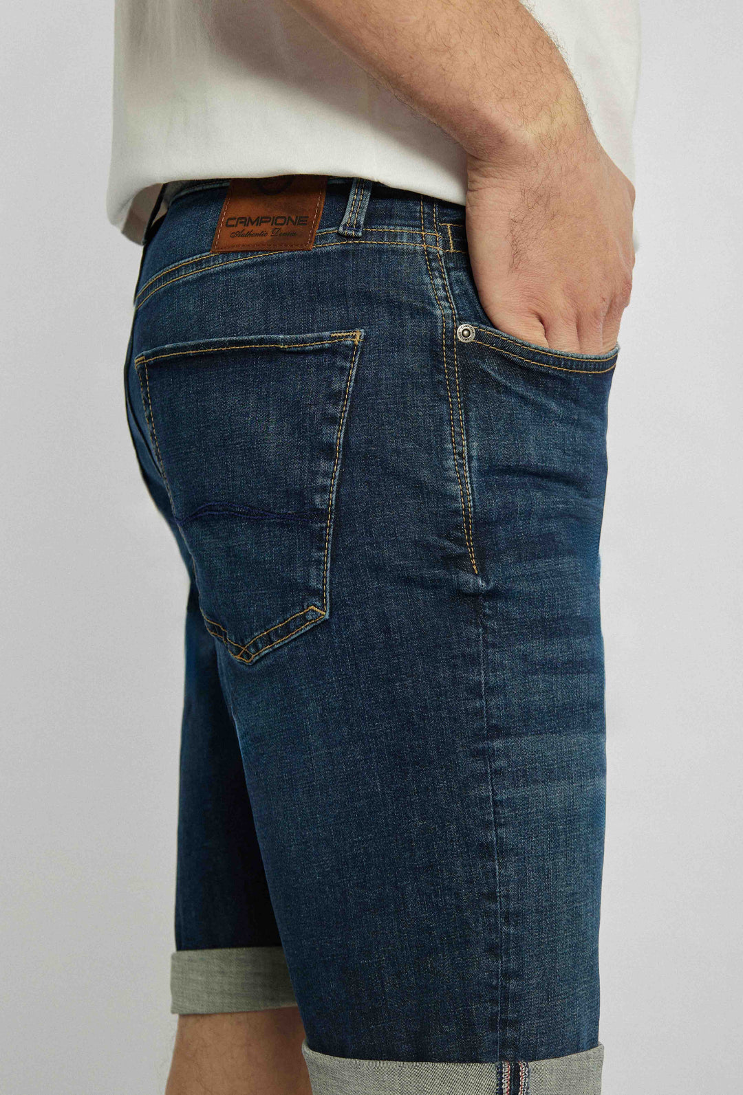Short denim shorts with sewn-on details and turned-up legs