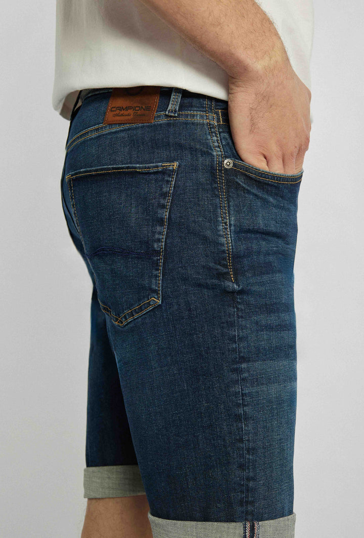 Short denim shorts with sewn-on details and turned-up legs