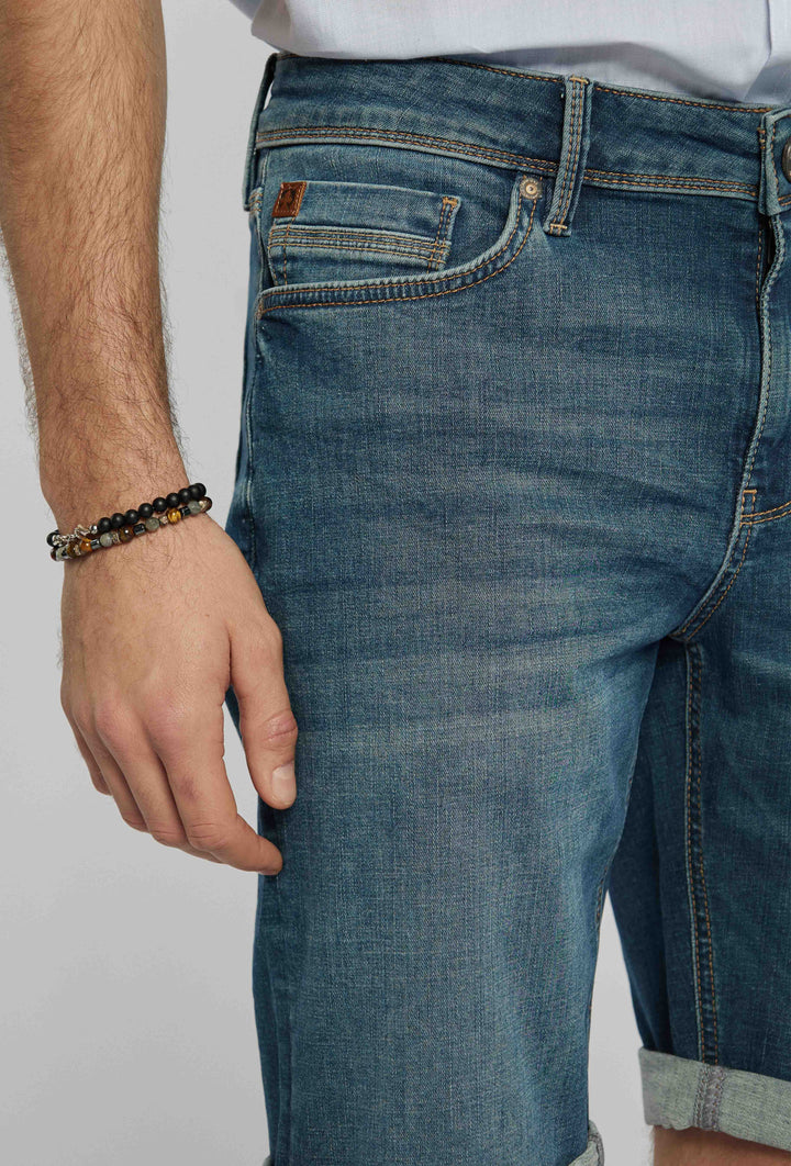 Short pants made of denim material, rolled up