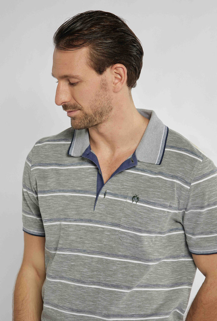 Gray polo shirt with navy and white stripes and brand logo on chest