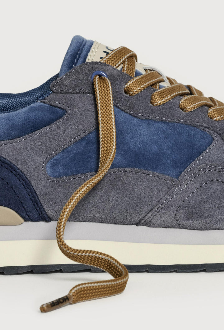 Blau-graue Sneaker mit beigen Einsätzen