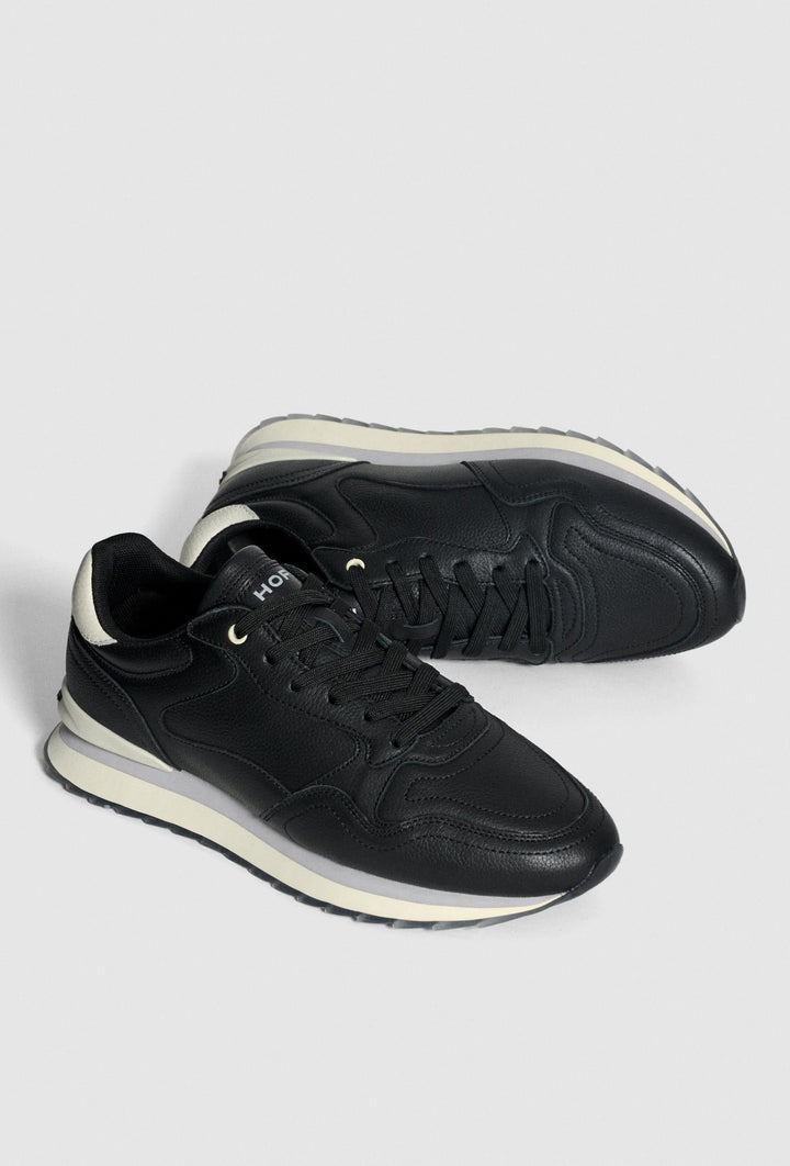 Schwarze Sneaker mit Neondetails