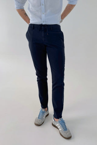 Cotton pants with tapered leg and binding