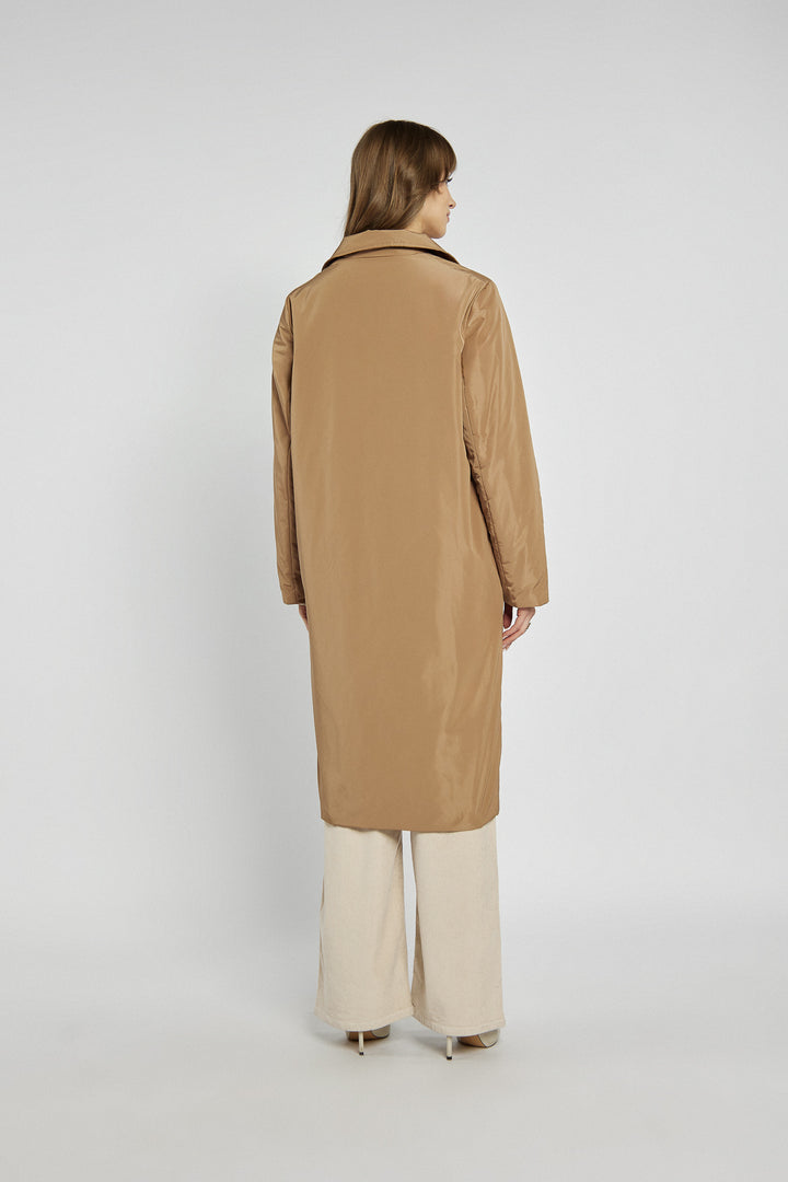 Beige long coat with double-breasted fastening