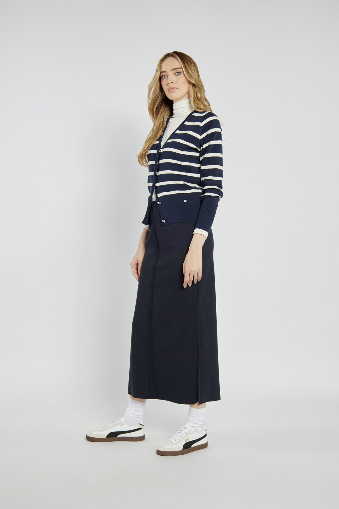 Navy blue knitted midi skirt with a slit