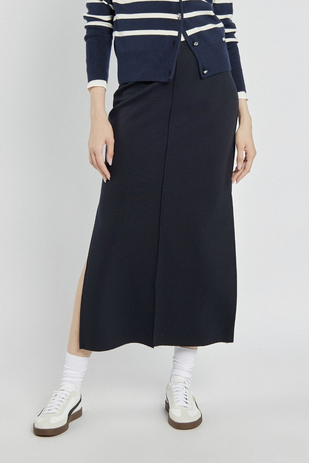 Navy blue knitted midi skirt with a slit