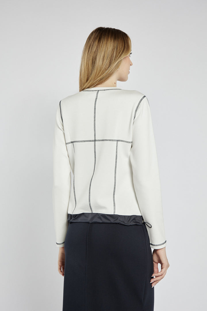 White sweatshirt with black stitching and graphics