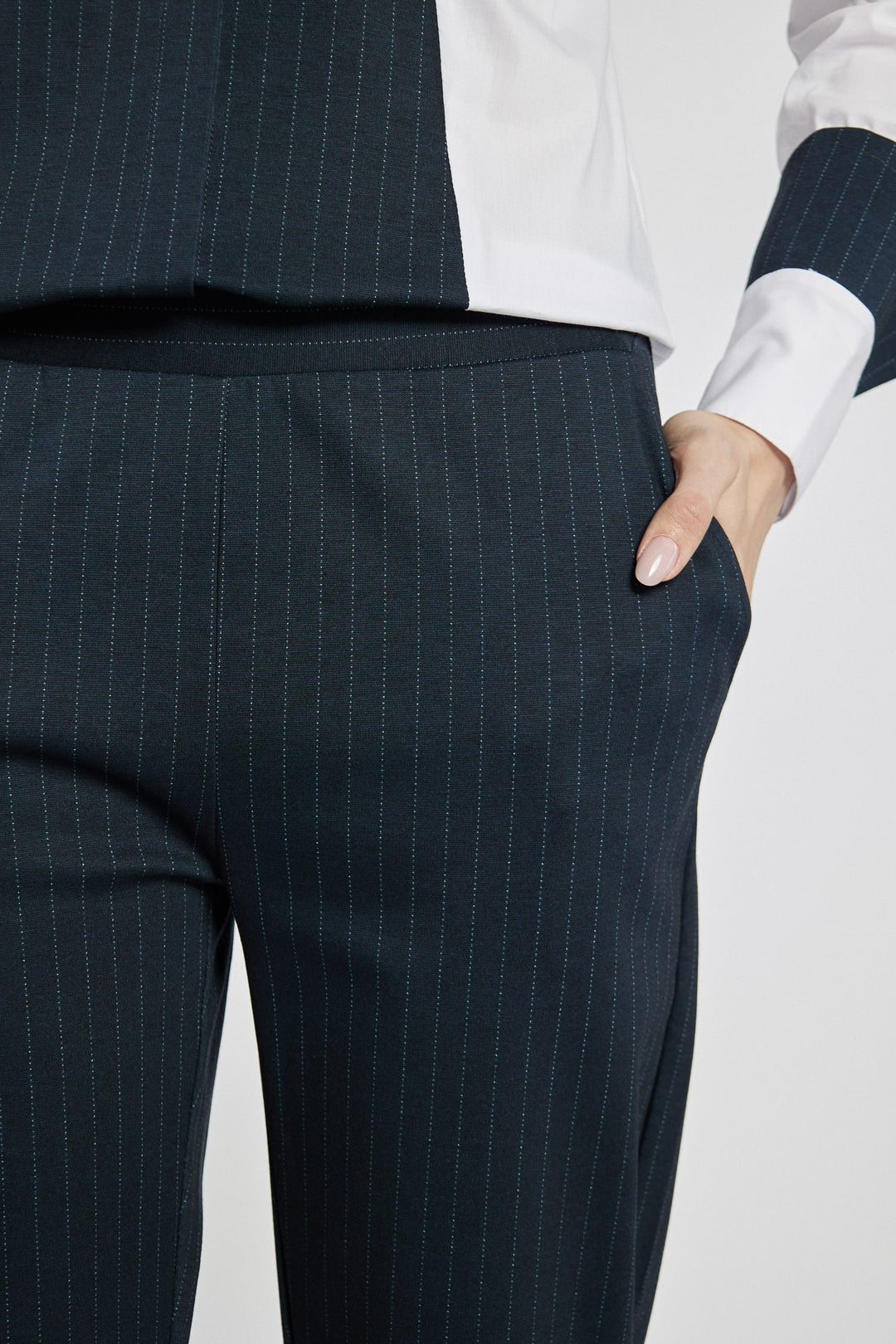 Navy blue striped pants with an elastic waist