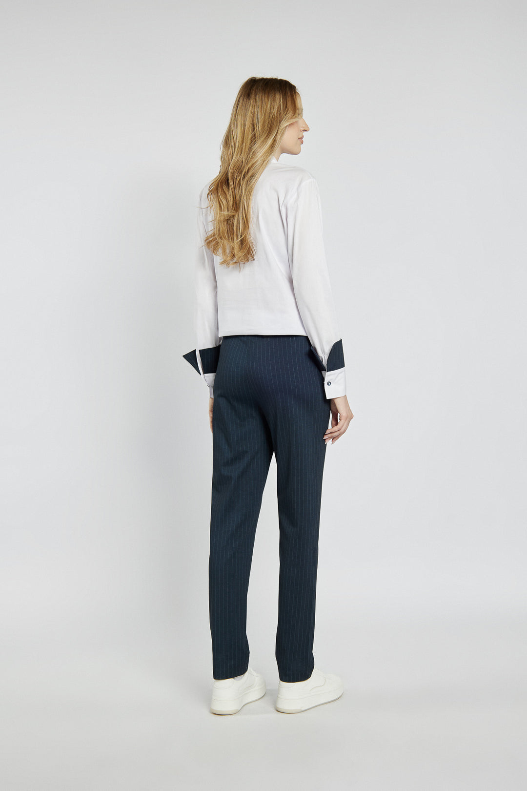 Navy blue striped pants with an elastic waist
