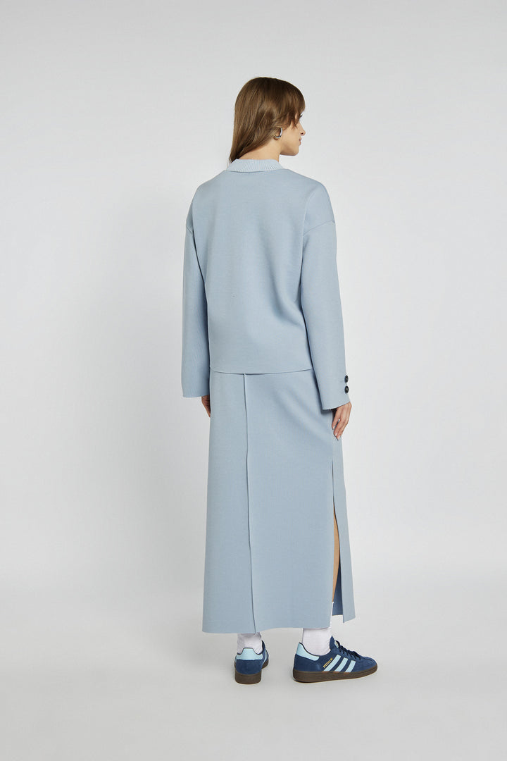 Blue knitted midi skirt with a slit