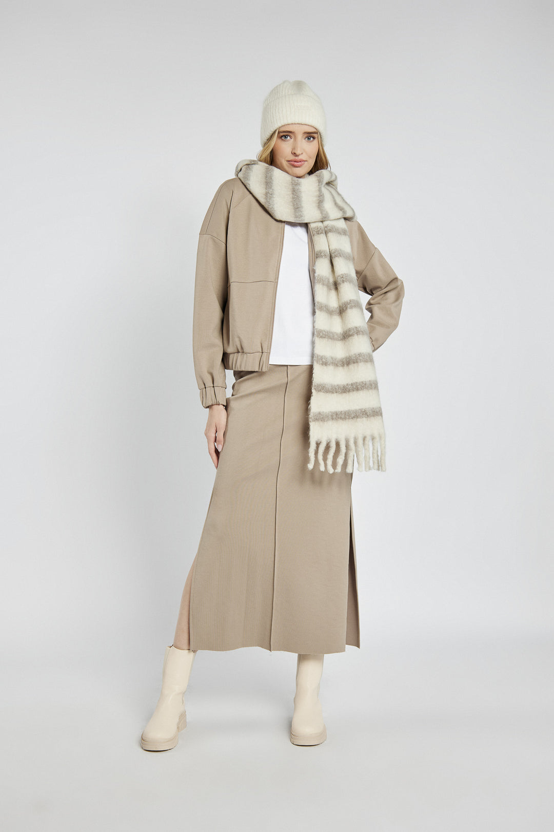 Beige zip-up sweatshirt with decorative stitching