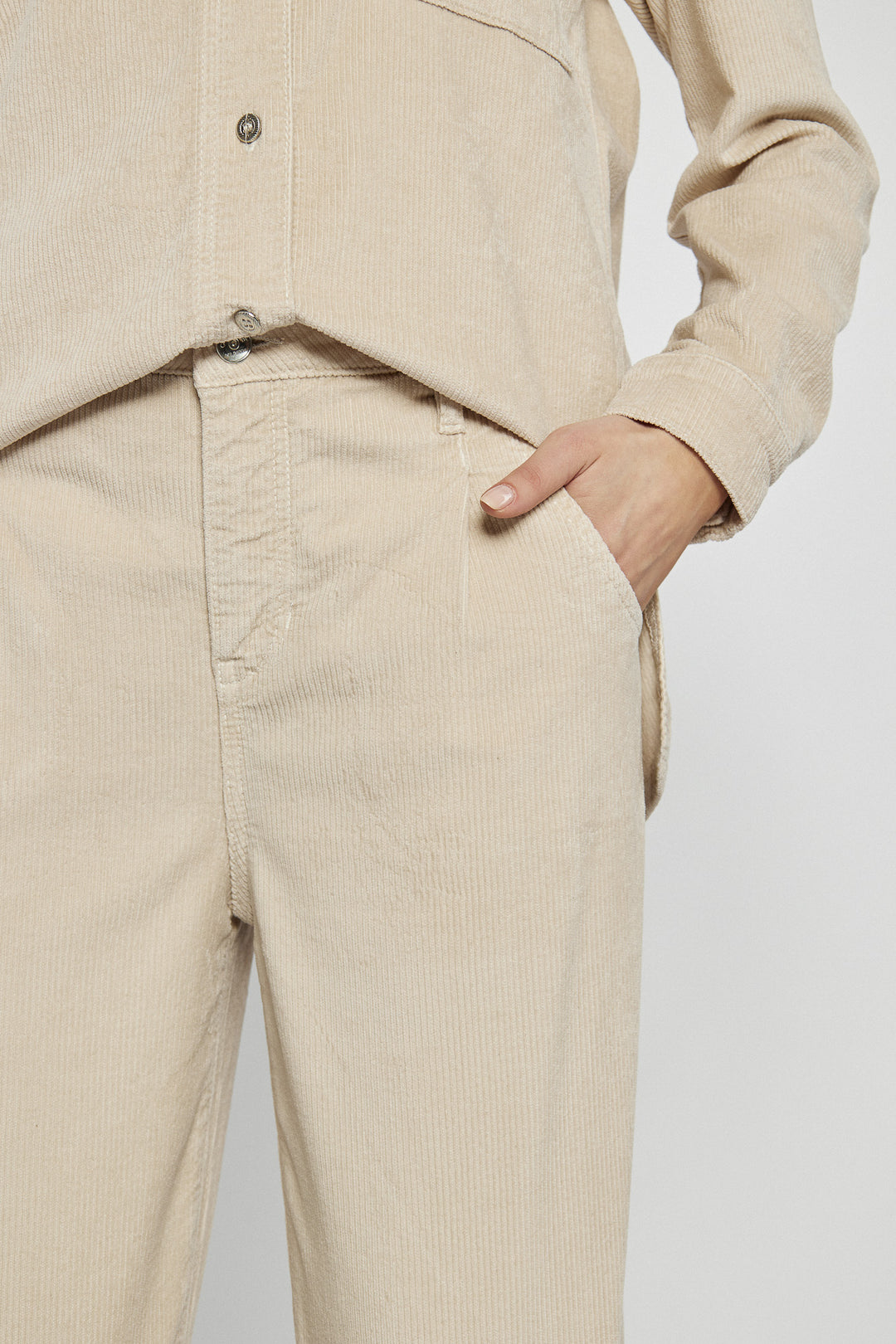 Beige corduroy pants with a straight cut