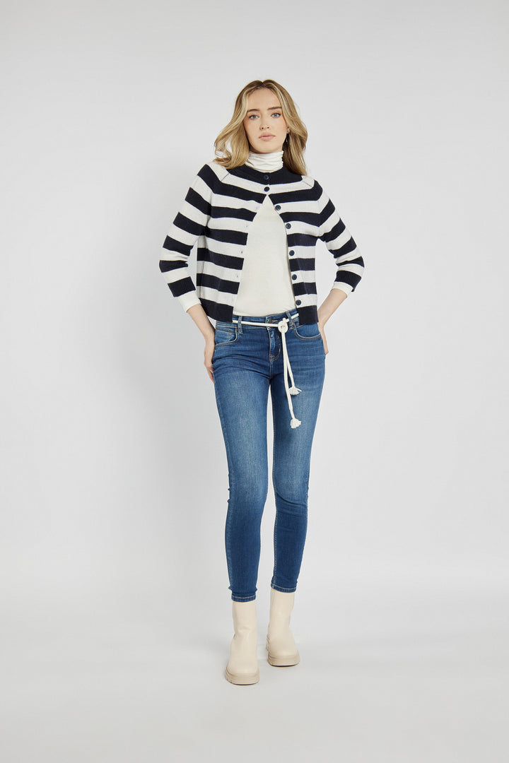 Navy blue jeans with a braided belt