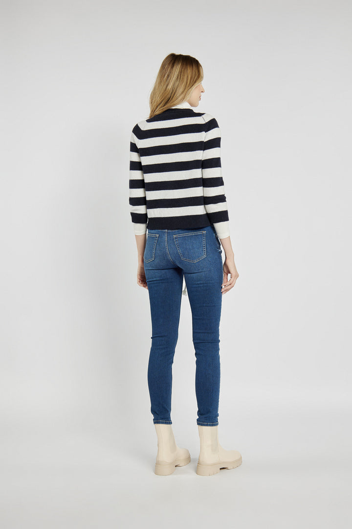 Navy blue jeans with a braided belt