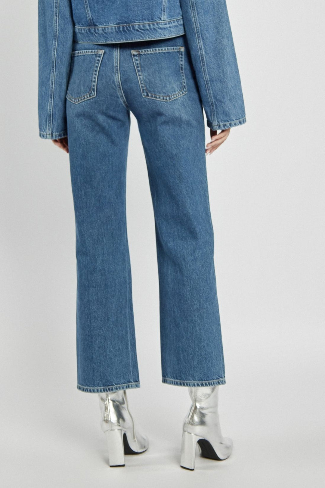 Navy blue wide-leg jeans with studs