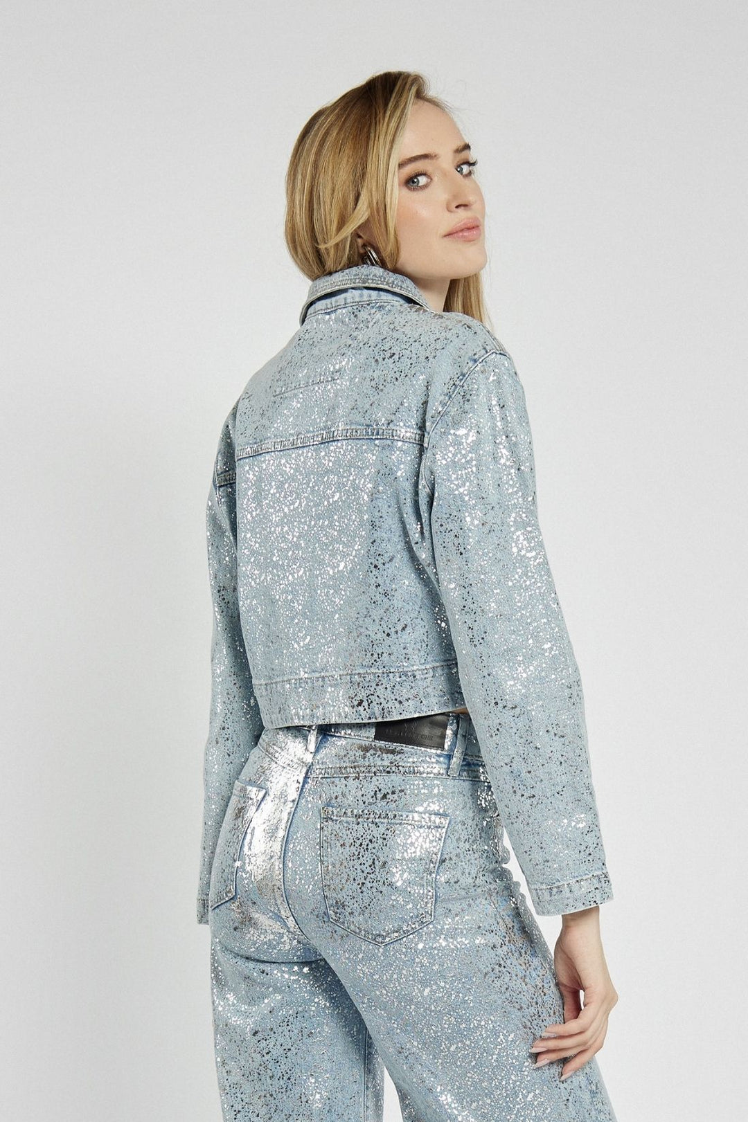 Women's short denim jacket with metallic dots