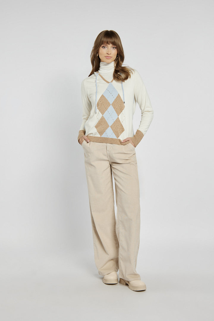 Women's beige and blue diamond pattern turtleneck sweater