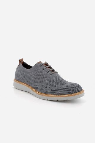 Material shoes tied with laces