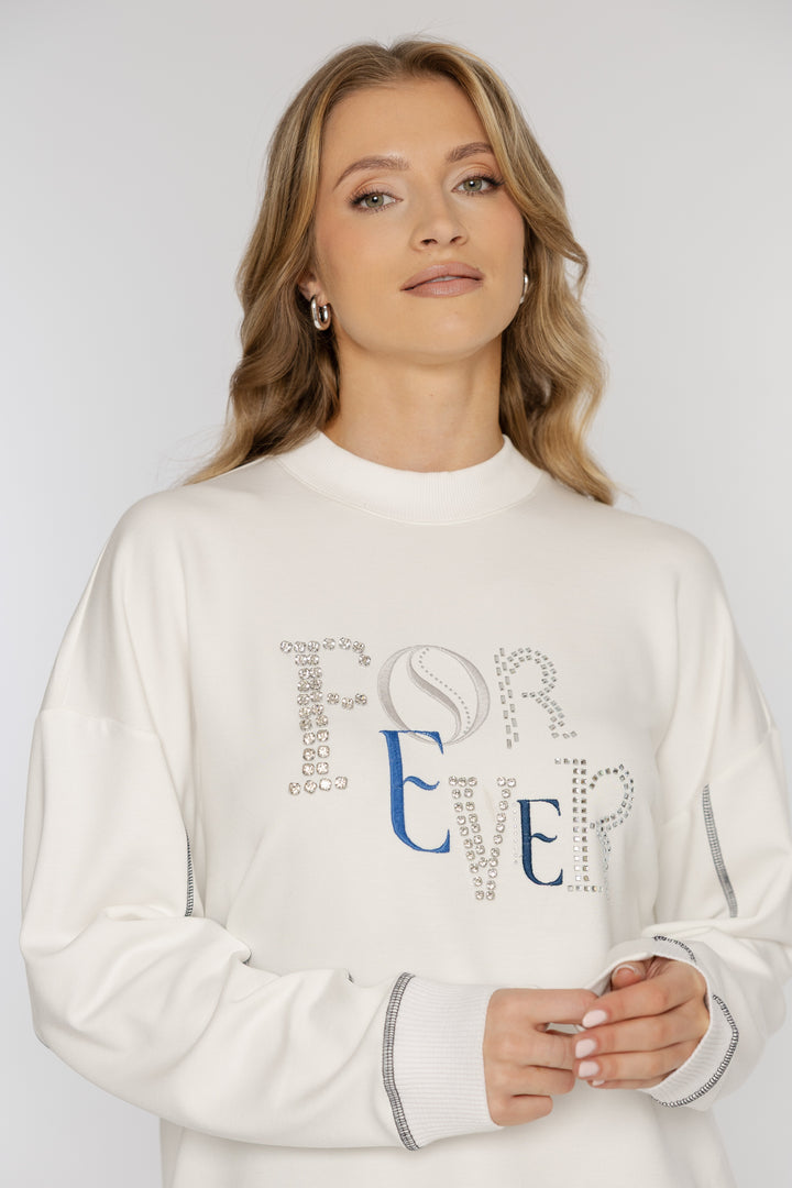 Damen-Freizeitset mit weißem Sweatshirt und Barrel-Jeans