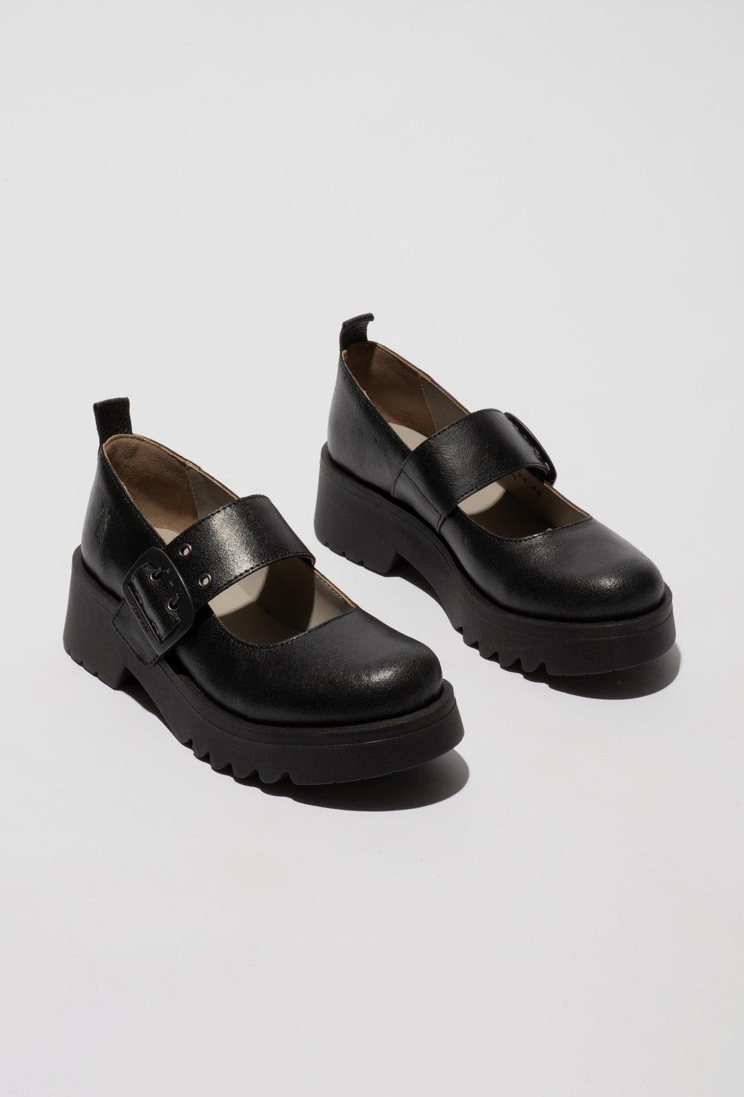 Black Loafers with a Chunky Buckle