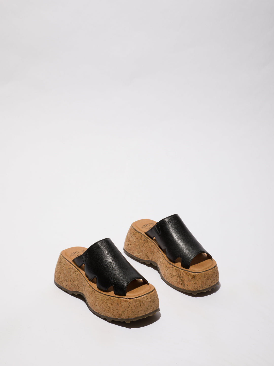 Black Shoes on a Cork Sole
