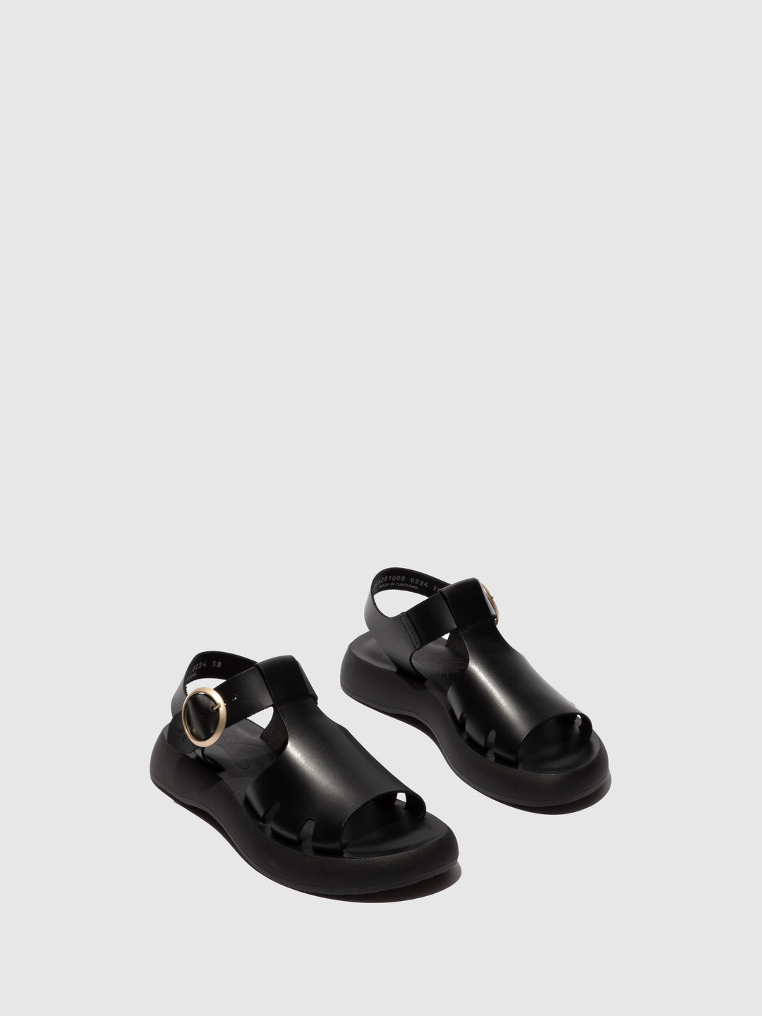 Black Closed Shoes with a Decorative Fastening and Chunky Sole