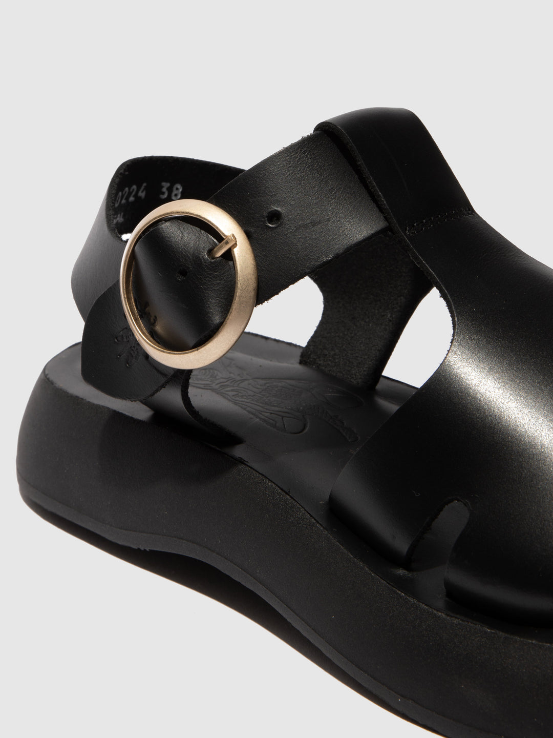 Black Closed Shoes with a Decorative Fastening and Chunky Sole