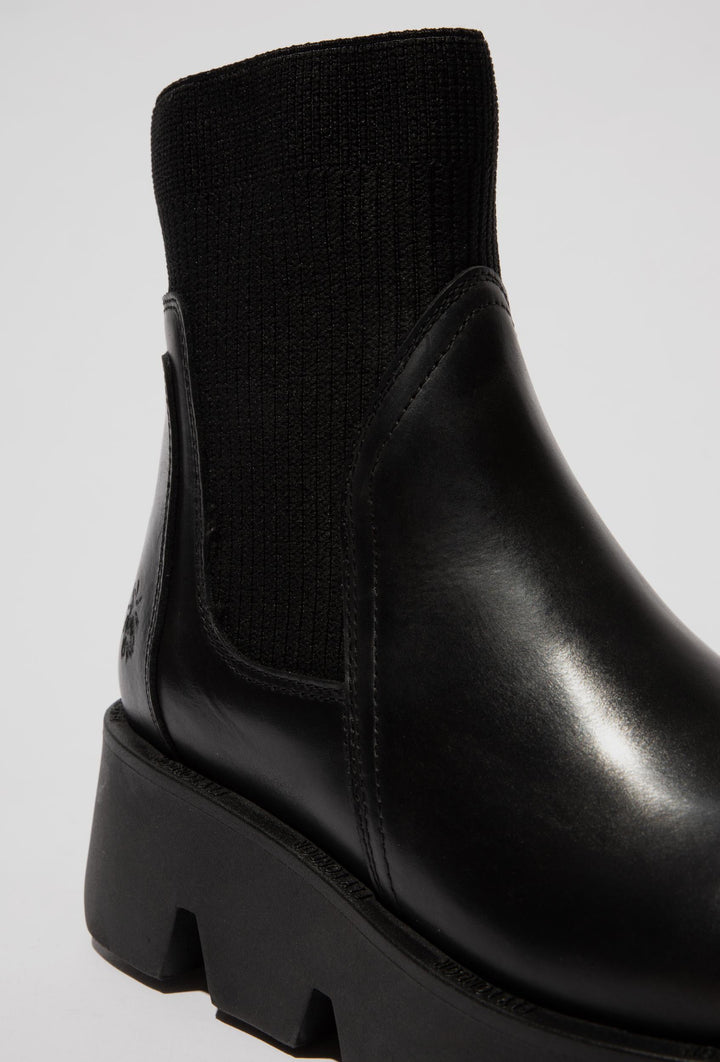 Leder-Stiefeletten mit Strickschaft