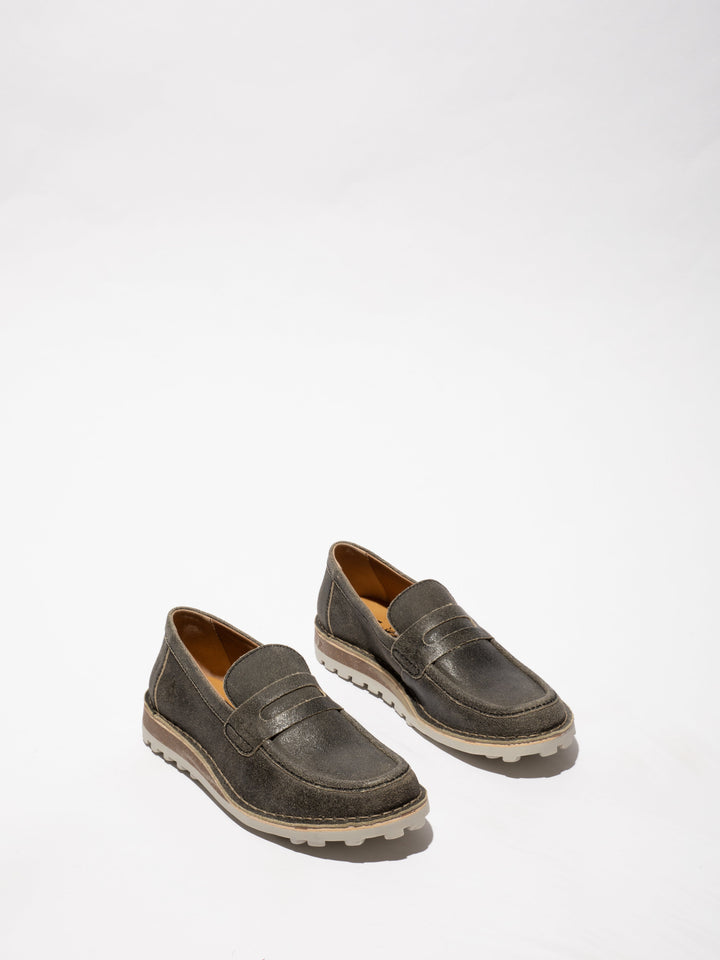 Brown Shoes with Decorative Stitching and a Two-Tone Sole on a Slight Platform