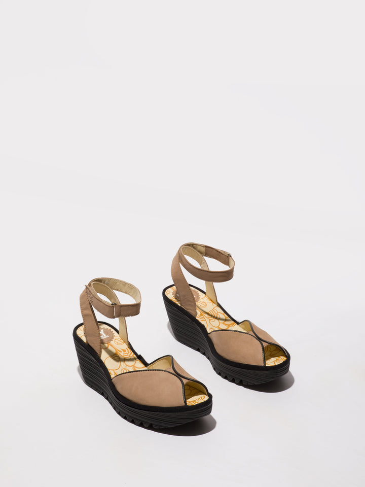 Brown Shoes with a High Wedge and Ankle Fastening